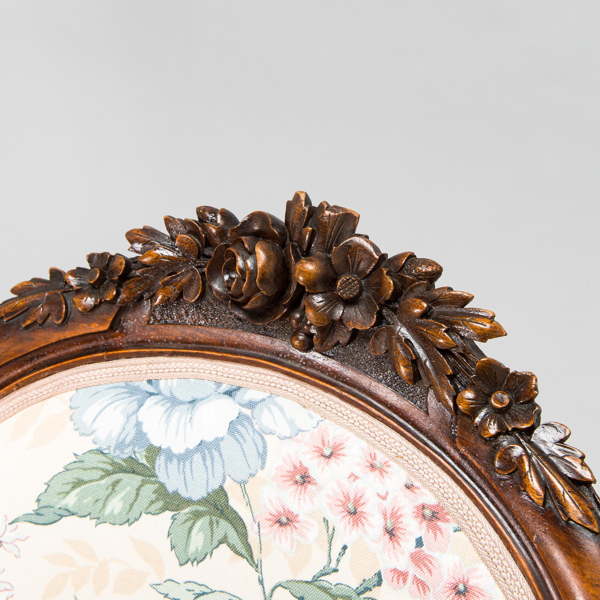 A late 19th century armchair in Rococo style.