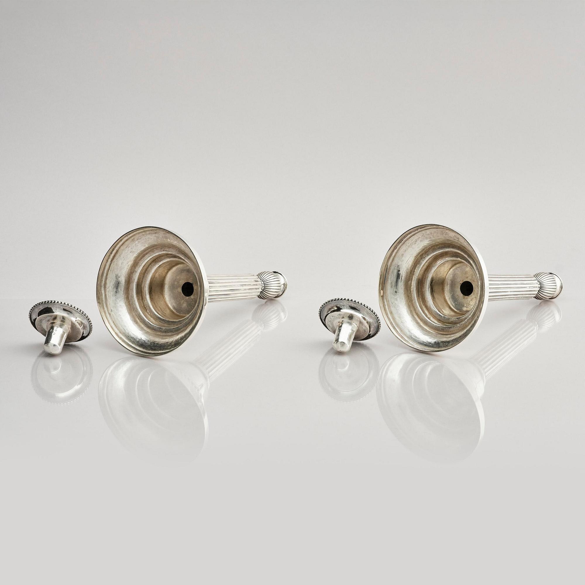 A pair of 18th century silver candlesticks, marks of Johan Ekholm, Stockholm 1788.