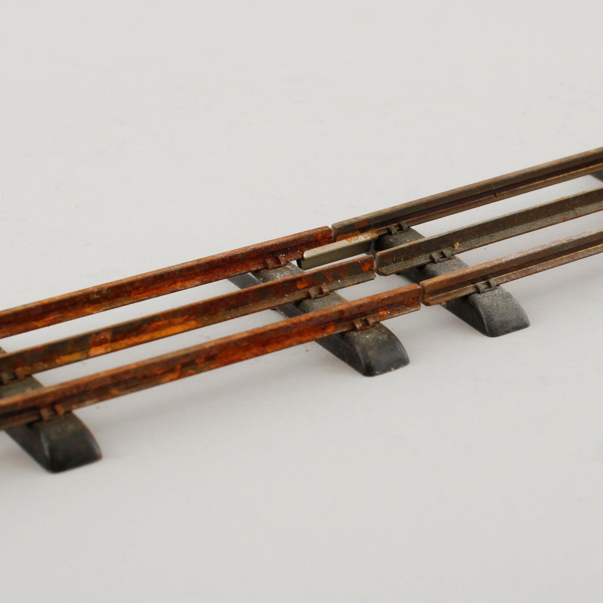 A 1940/50s model train set of 31 pcs in O-scale made by HAG, Switzerland.