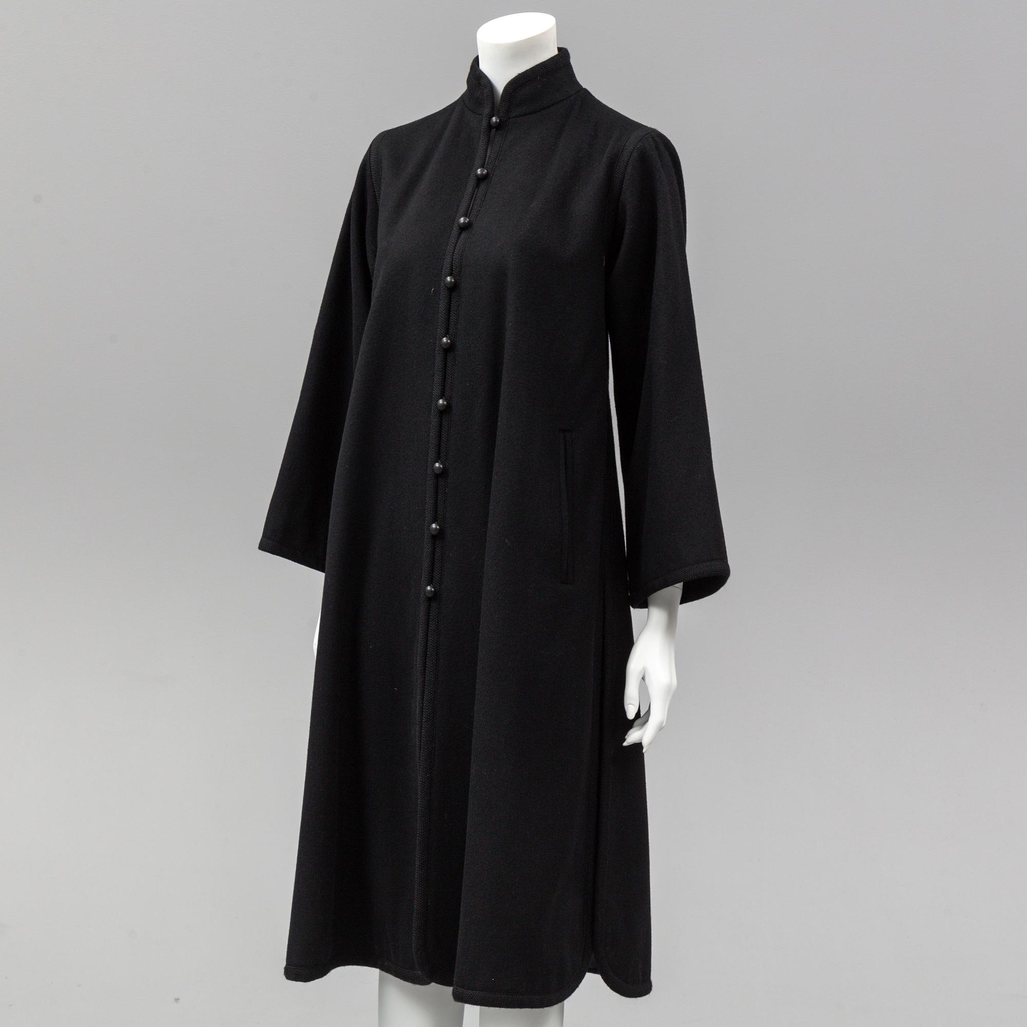 YVES SAINT LAURENT, a 1960's-70's coat, size 36.