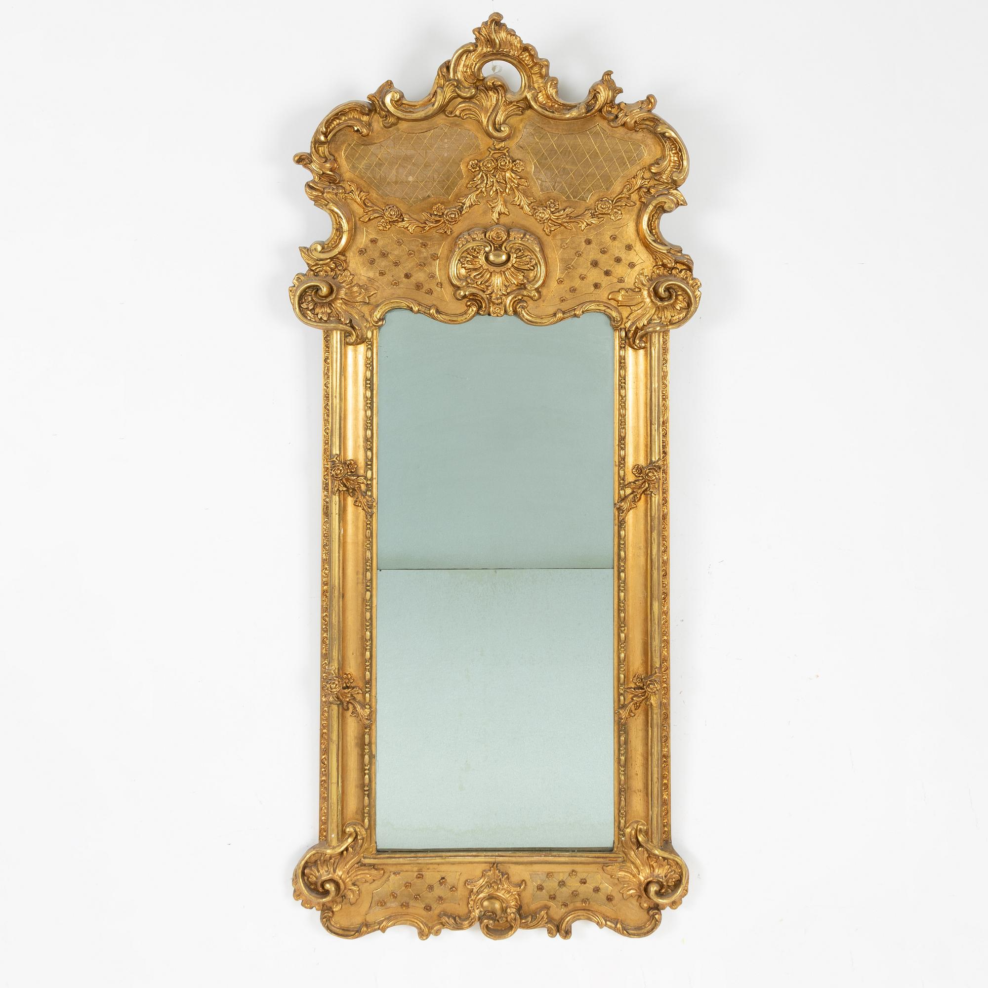 A Rococo style mirror, second half of the 19th Century.
