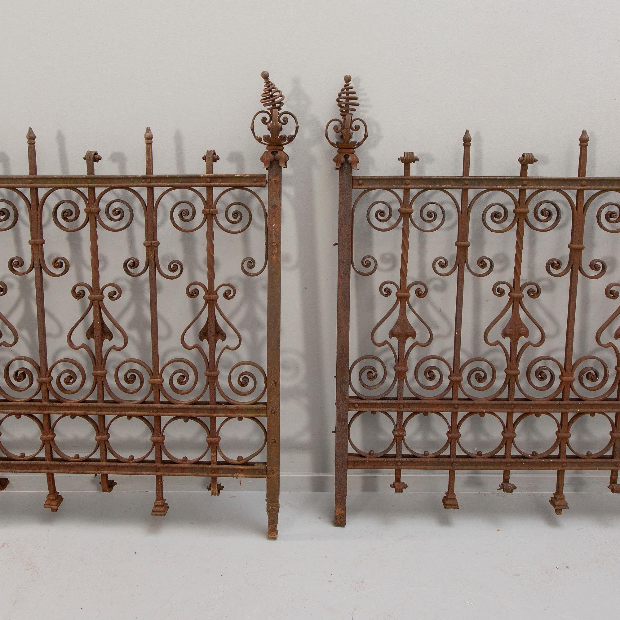 A cast iron two part fence around 1900.