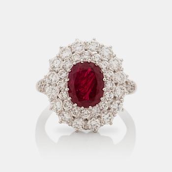 An untreated 4.33 ct, burmese ruby and brilliant cut diamond ring. Cert SSEF.