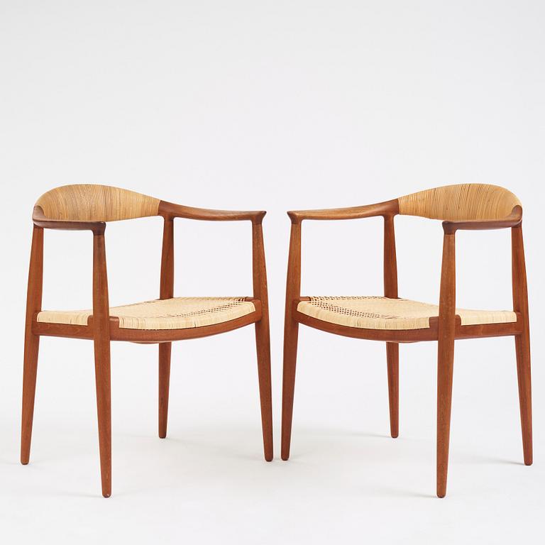 Hans J. Wegner, a pair of teak and rattan 'The Chair', JH-503, Johannes Hansen, Denmark 1950s.