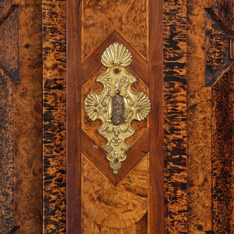 A Swedish late baroque burr-alder cabinet, first part 18th century.