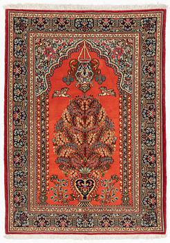 A Quum rug, ca 152 x 106 cm.