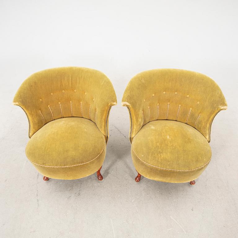 A pair of 1940/50s easy chairs.