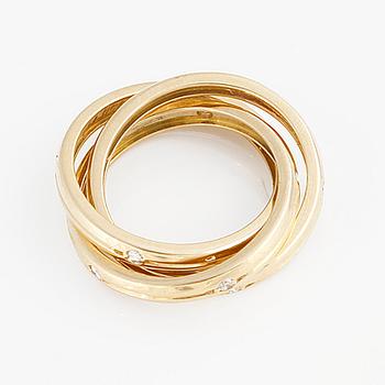 A brilliant-cut diamond "Trinity" Cartier ring.