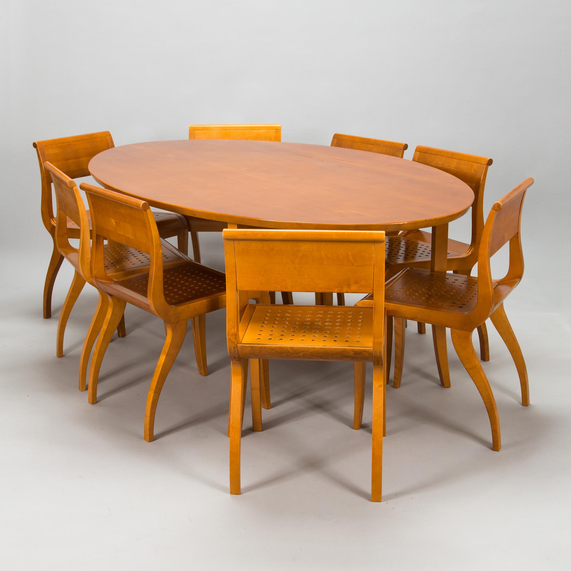 Kimmo Varjoranta, a 9-piece 'Kaiku' dining set retailer  Sope Kaluste. In production 1985-1995.