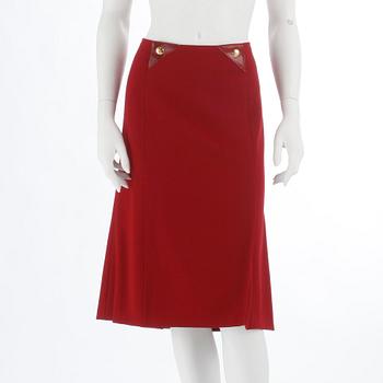CÉLINE, a red woolblend skirt, size 46.