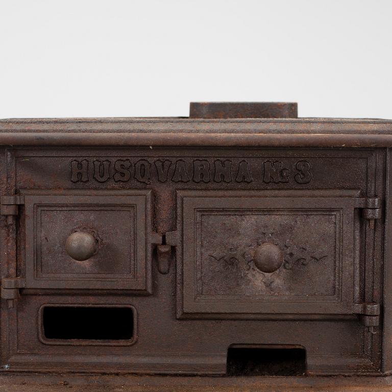 A cast iron toy stove, Husqvarna, Sweden, early 20th century.