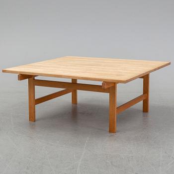 An oak coffee table by Hans J Wegner for Andreas Tuck, Denmark.