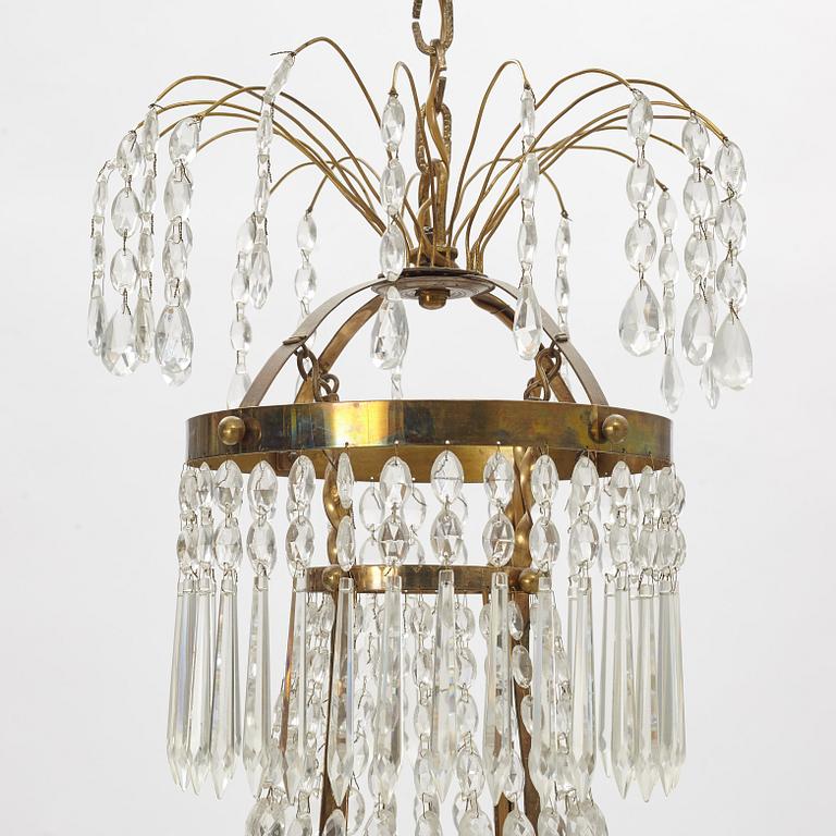 A thirteen-light gilt-brass and cut glass late Empire chandelier, 1830's/40's.