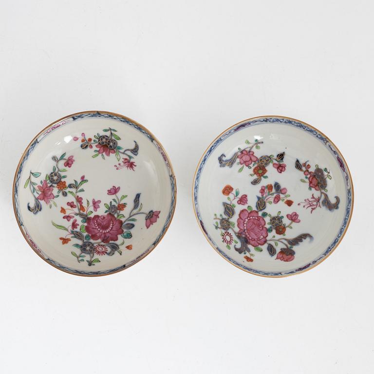 Twelve Chinese famille rose cups on stands, Qing dynasty, Qianlong (1736-95).