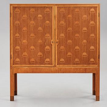 HANS J WEGNER, an "Acorn" cabinet by cabinetmaker Mikael Lauersen, Denmark 1940's.