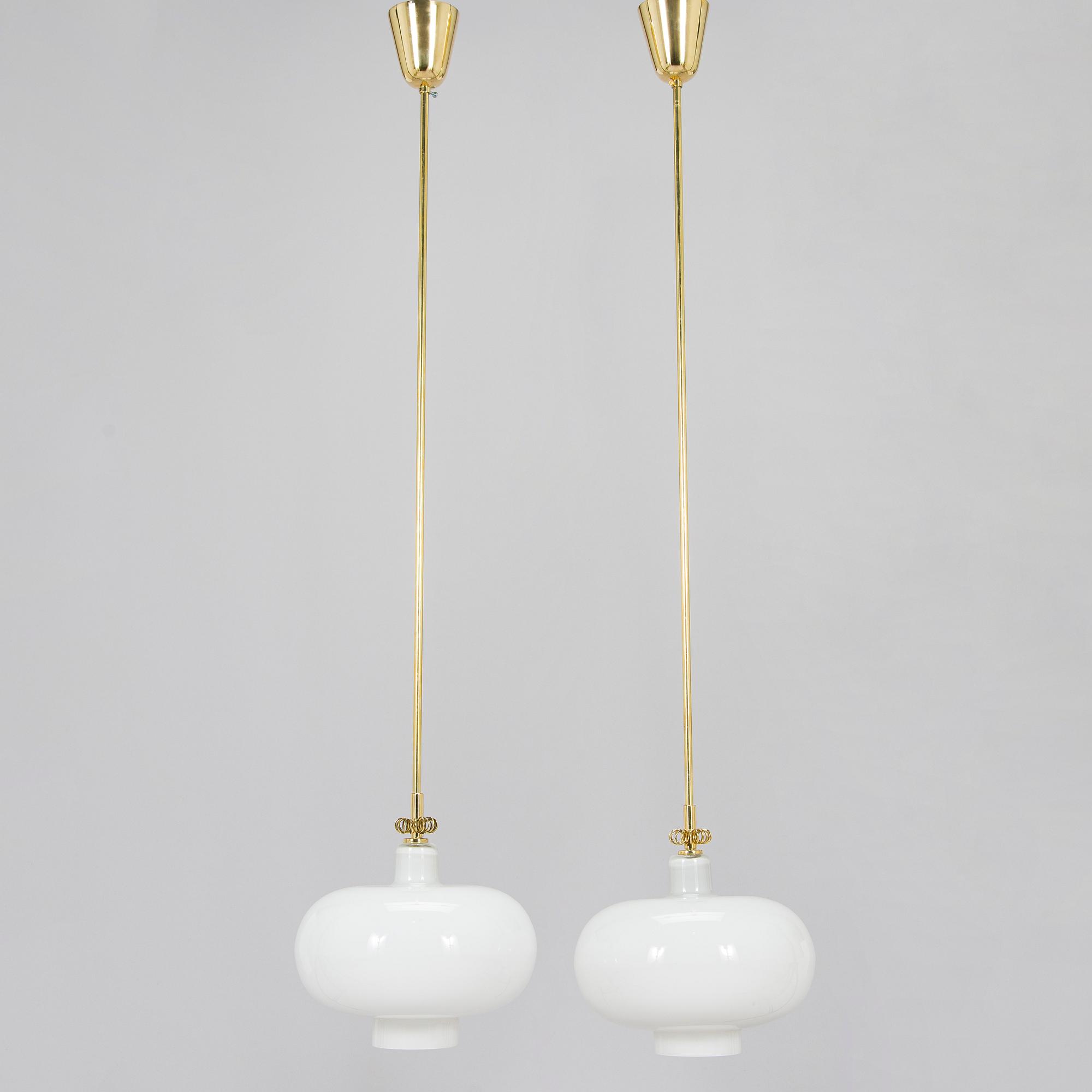 Paavo Tynell, a pair of mid-20th century 'K2-19' pendant lights for Idman.