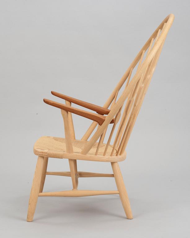 A Hans J Wegner ash and teak 'Peacock chair', by PP Møbler, Denmark.