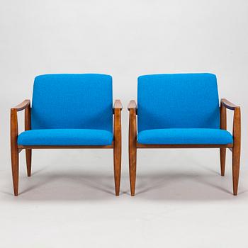 A pair of 1950's armchairs.