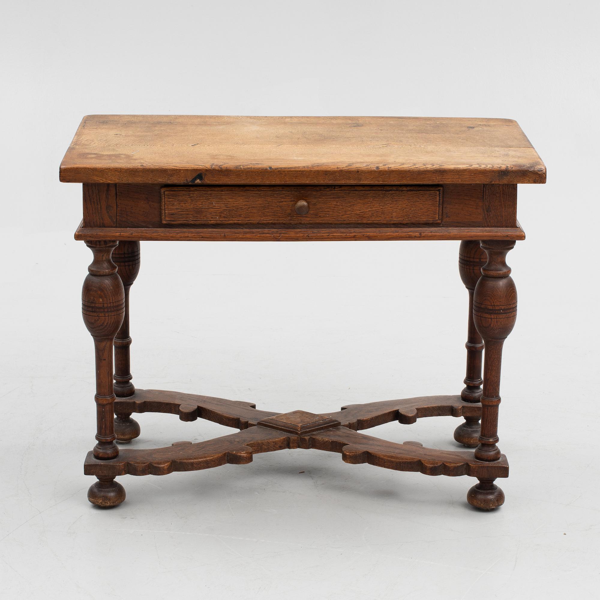 A table, late 19th century. Baroque style.
