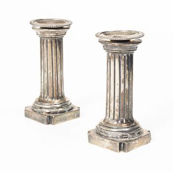 A pair of English silver candlesticks, mark of Arthur Sibley, London 1872.