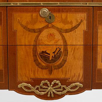 A Gustavian style chest of drawers, mid 20th Century.