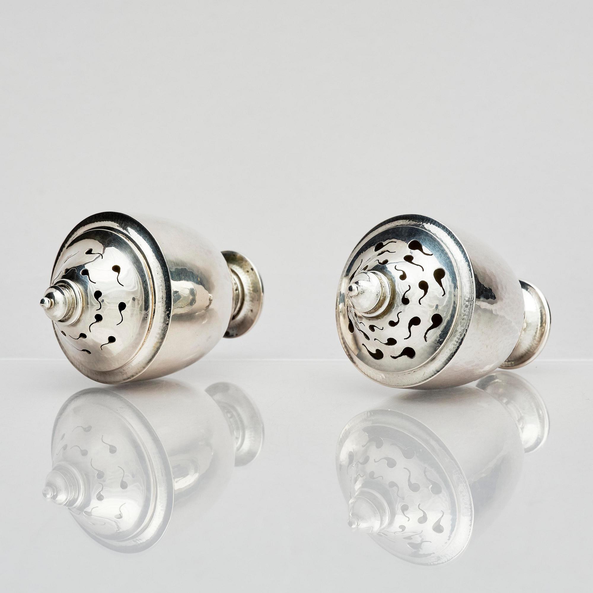 Georg Jensen, a pair of silver casters, design Johan Rohde, Copenhagen 1915-1921.
