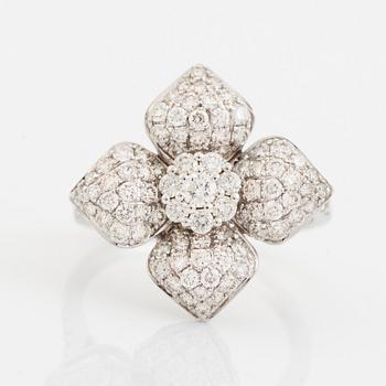 Brilliant cut diamond flower ring.