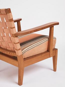 Nordiska Kompaniet, a pair of stained pine 'Lovö' easy chairs, Sweden ca 1939.