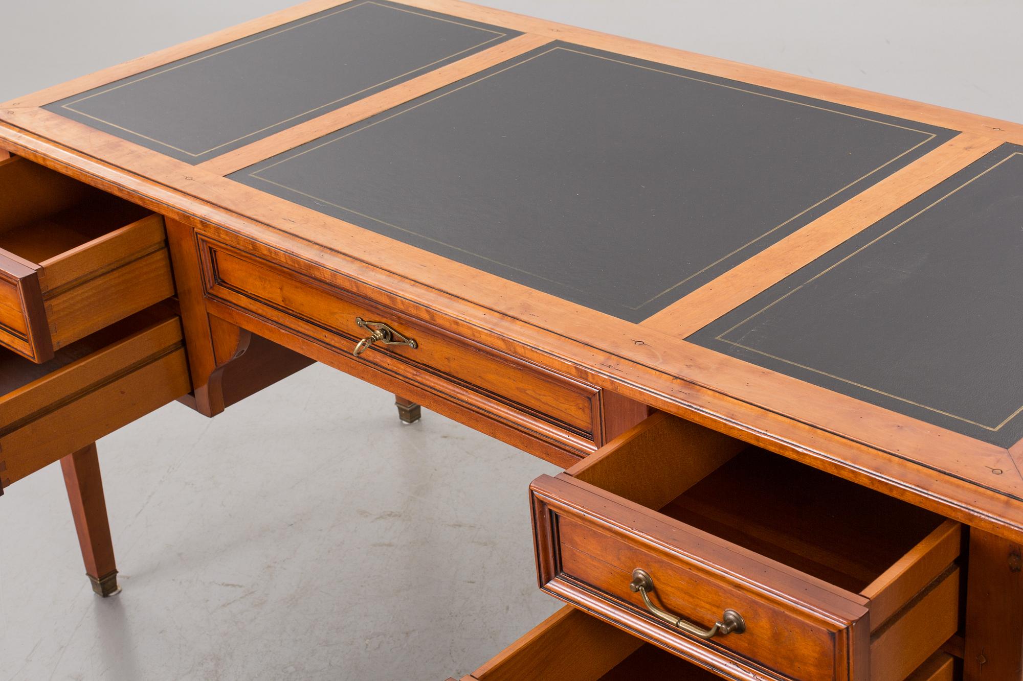 A FRANCE WRITING DESK AND A CHAIR FROM GRANGE.