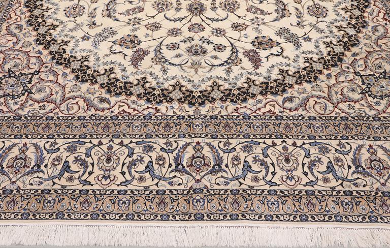 A Nain part silk carpet, 407 x 304 cm.