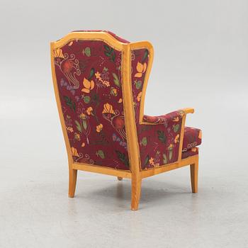 Carl Malmsten, a 'Husfadern' armchair, Sweden, jubilee model 1988.