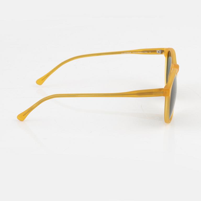 Illesteva, a pair of yellow sunglasses.