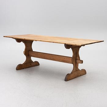 A Swedish pine trestle table, 18th / 19th century.