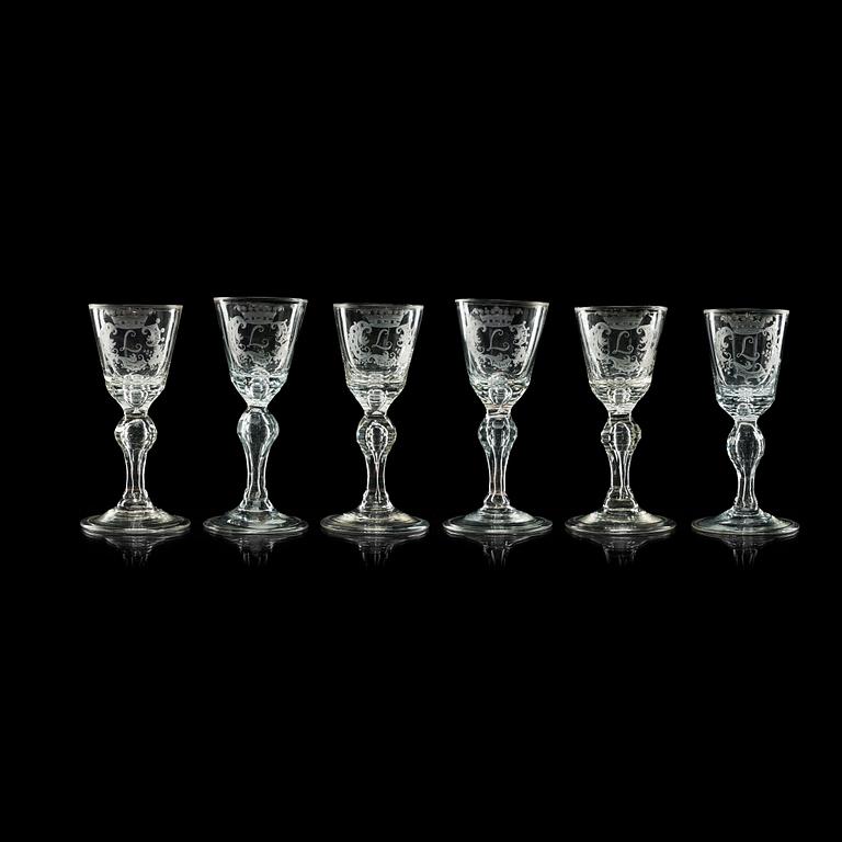 A set of six cut and engraved glasses, 18th Century.