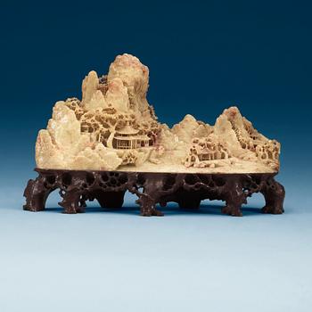 A Chinese soapstone sculpture of a landscape, 20th Century.