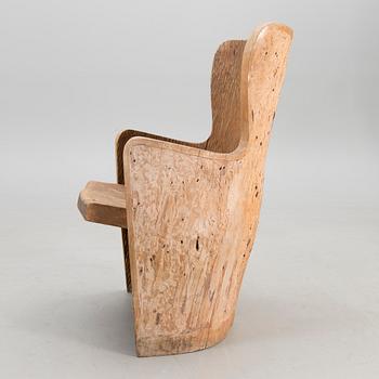 An early 20th century armchair so called field chair.