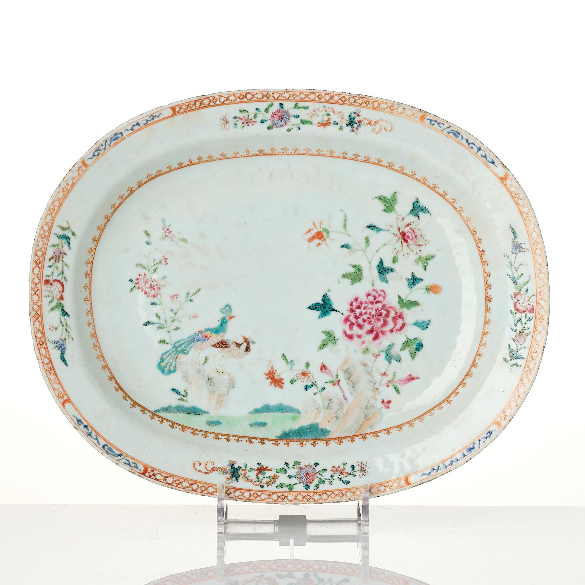 A group of famille rose 'double peacock' serving dishes, Qing dynasty, Qianlong (1736-95). (8 pieces).