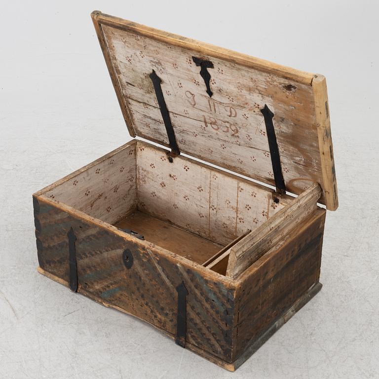 A chest, dated 1852.
