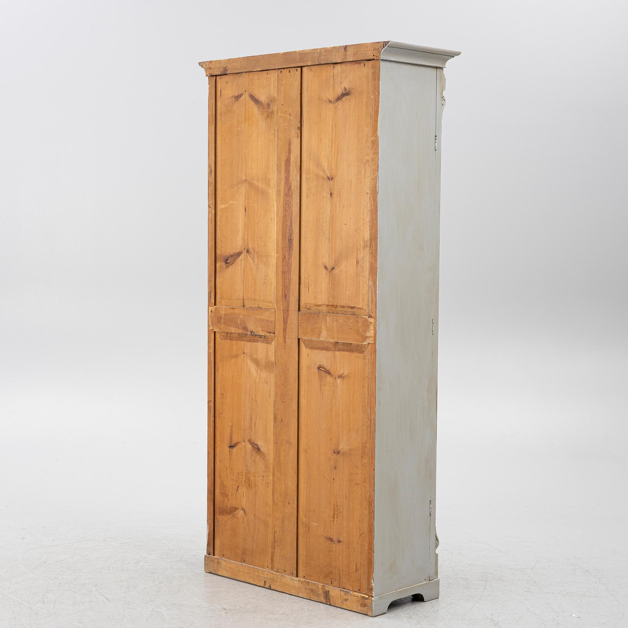 Display cabinet, circa 1900.