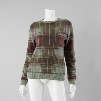 a sweater by Ralph Lauren, in size L.