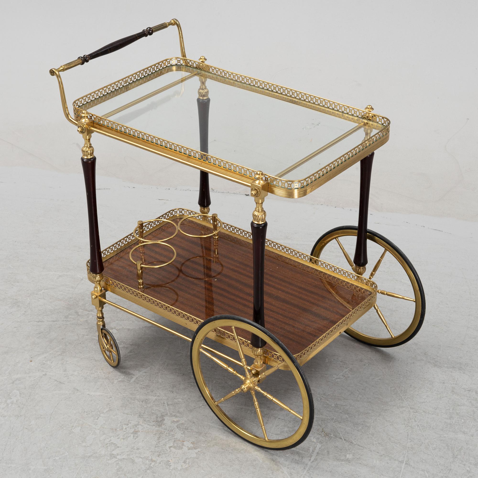 A brass and mahogany veneered drink's trolley, second half of the 20th Century.