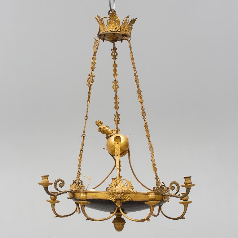 An Empire-style nine-light hanging lamp, late 19th century.