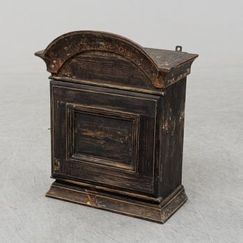 A circa 1900 small cabinet.