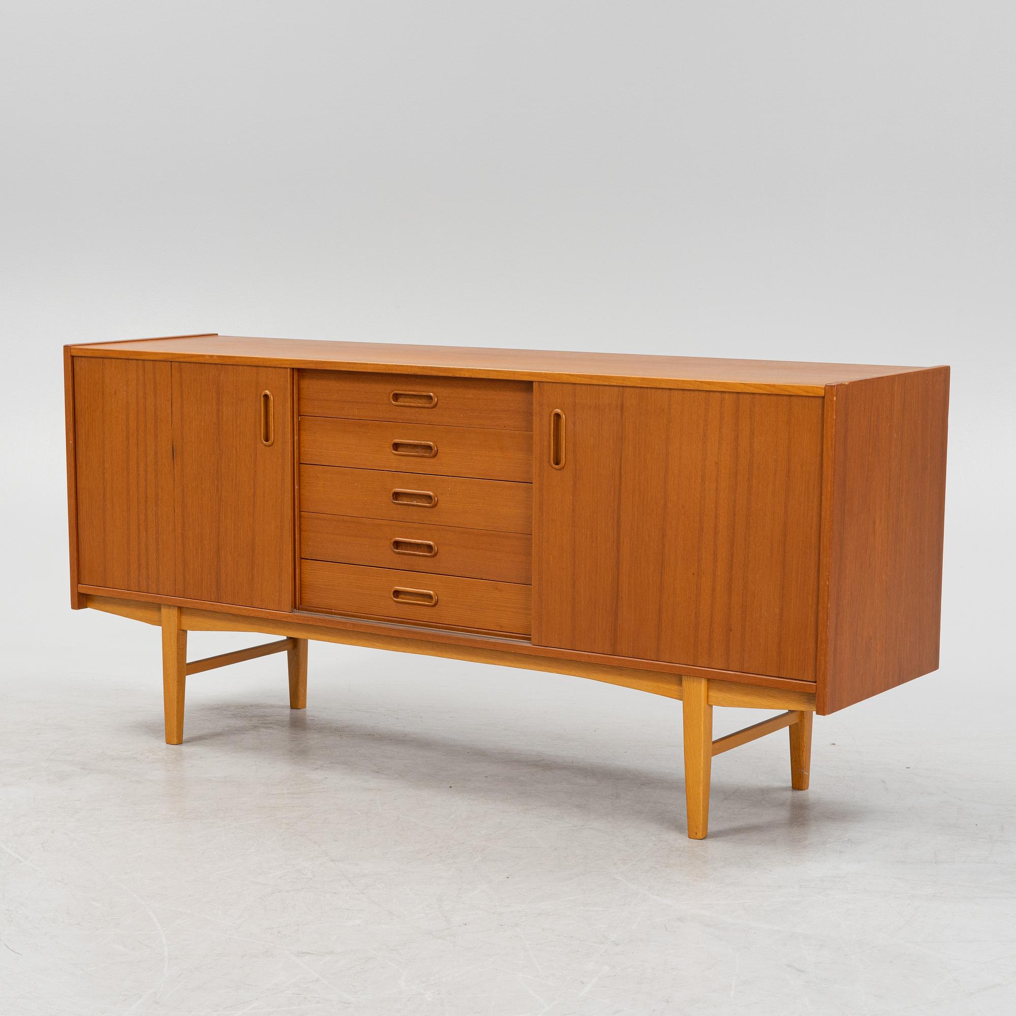 A 1950's/60's teak veneered sideboard.