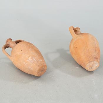 Two European earthenware jars from the first half of the 20th century.