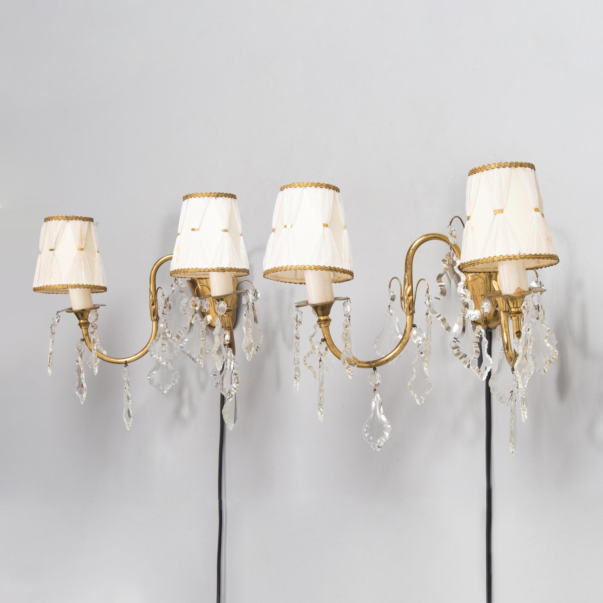 Mauri Almari, a pair of mid-20th-century brass wall sconces for Idman.