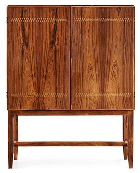 490. A Carl-Axel Acking palisander cabinet, Nordiska Kompaniet (NK) 1940's-50's.