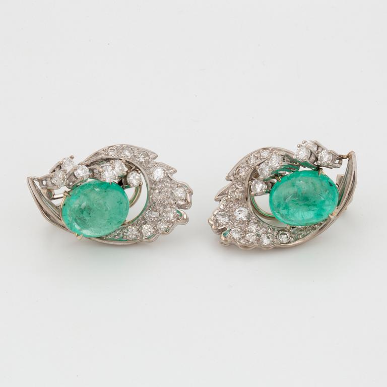 Cabochon-cut emerald and brilliant-cut diamond earrings.