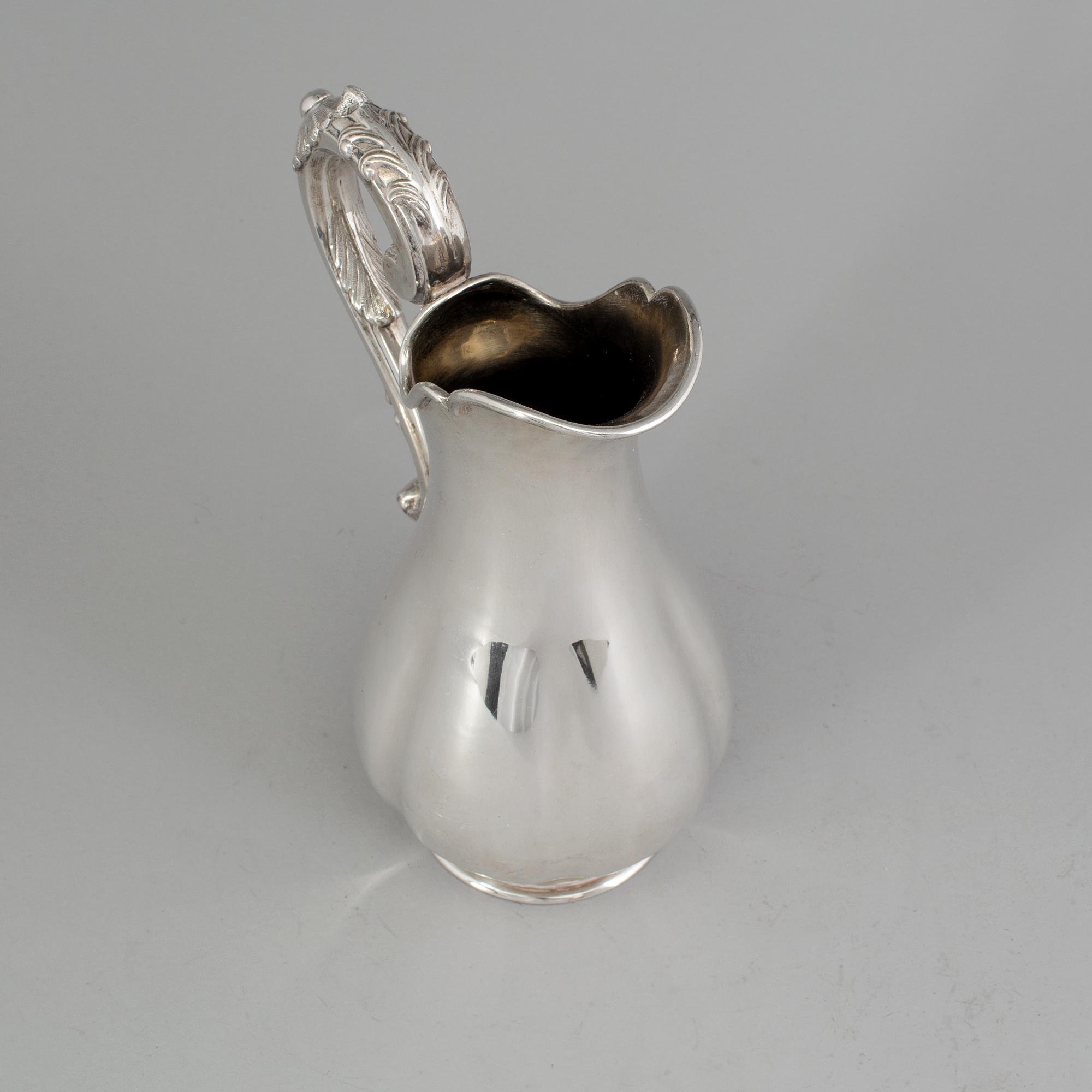 A Swedish silver water pitcher, maker's mark Gustaf Theodor Folcker, Stockholm, 1860. Weight 647 g.