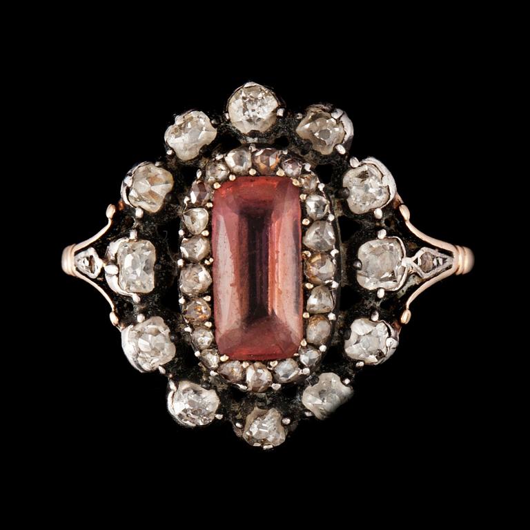 A topaz and rose-cut diamond ring. Made by W.A Bolin jeweller to the Swedish court, Stockholm 1928.